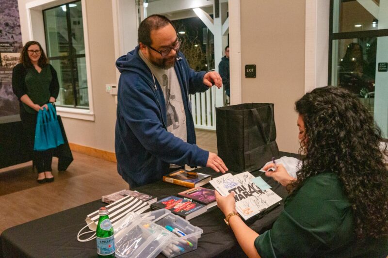 Numerous books owned by Herman Wong are signed by One Story, One City featured author Zoraida Córdova for her works in the Star Wars series on March 1, 2025 at the Mitchell River House in Canyon Country, Calif. Katherine Quezada/The Signal