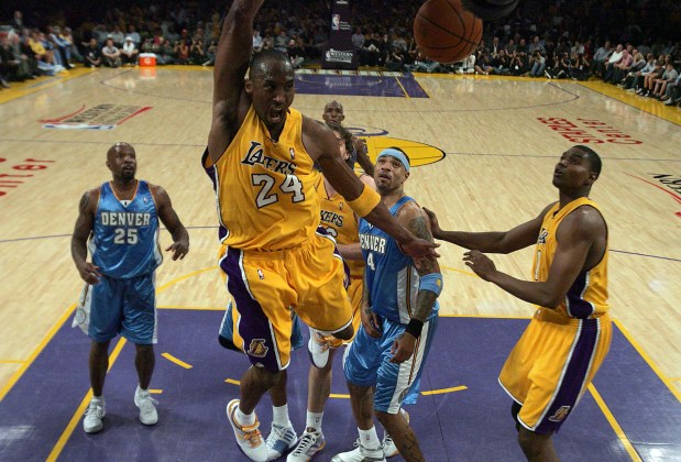 Laker Kobe Bryant #24 slam dunks in the first half during game one of a Western Conference final playoff basketball game between the Denver Nuggets and the Los Angeles Lakers at the Staples Center on Tuesday May 19, 2009 in Los Angeles. Photo by Keith Birmingham, Pasadena Star-News/SCNG)
