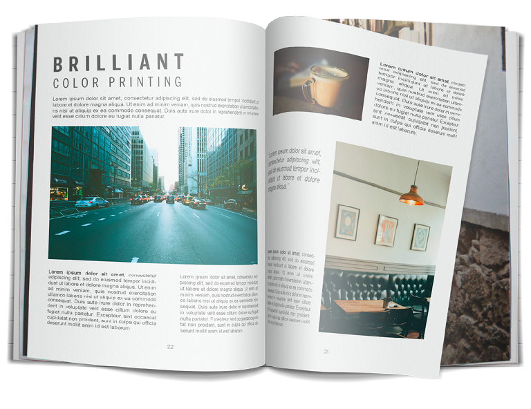 An open page of a book about brilliant color printing including a moody image of a busy road.